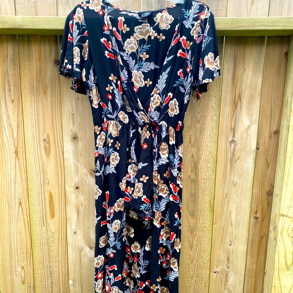 Floral romper with trail.